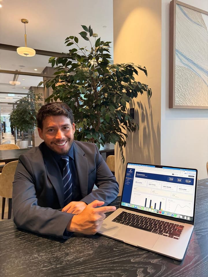 Diego Espinoza reviewing the Lumea client dashboard at the Dubai office